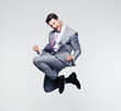 Funny businessman jumping in air