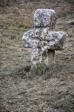 Ancient Stone Cross At The Abandoned Cemetery