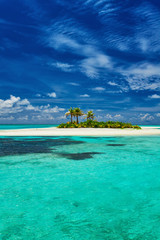 Wall Mural - Small island surrounder by reef and beach in Maldives