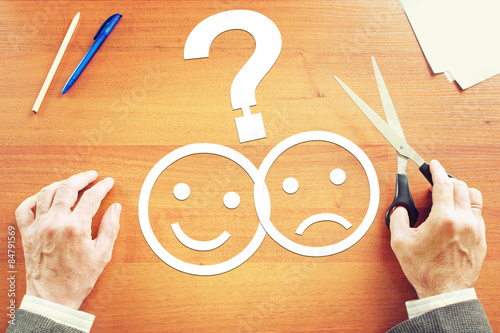 Fotografía Man makes choice between negative and positive emotions. Abstrac