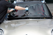 Glazier Removing Windshield Or Windscreen On A Car