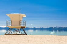 Beach Patrol Station On The Lake With View On Snowy Sierra Nevada Mountains.