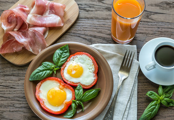 Sticker - Fried eggs with prosciutto on the wooden table