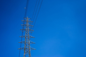 Electricity post and clear blue sky