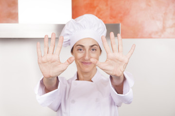 woman chef showing hands