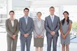 © WavebreakmediaMicro - Business people standing in a row