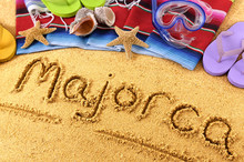 Majorca Spain Word Written In Sand On A Sandy Beach Background With Star Fish And Accessories Summer Spanish Holiday Vacation Photo