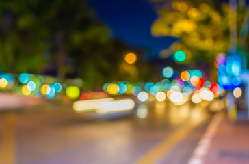 Wall Mural - Unfocused light of traffic in a street