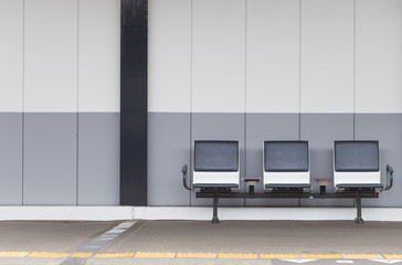 Outdoor empty  passenger seat at train station