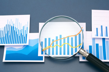 Poster - Analyzing data with magnifying glass.