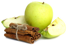 Green Apple And Cinnamon Sticks Isolated