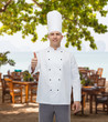 © Syda Productions - happy male chef cook showing thumbs up