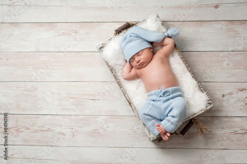 Fotografija Sleeping Newborn Baby Wearing Pajamas