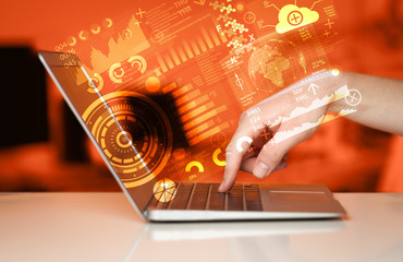 modern notebook computer with future technology symbols