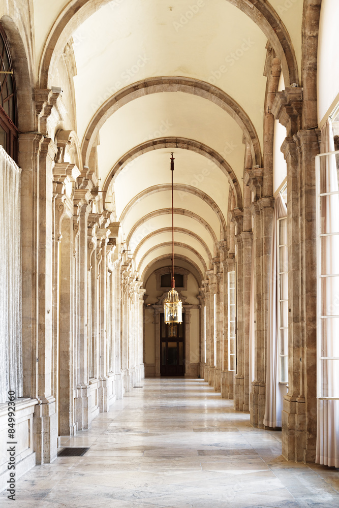 The beautiful passage with arches in the Royal Palace of Madrid - obrazy, fototapety, plakaty 
