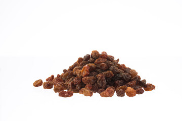 Wall Mural - Organic dried raisins in a pile isolated on white