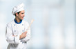 Smiling chef in front of a bright background