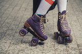 female legs in roller skating