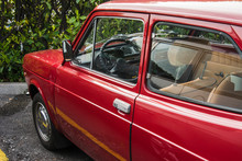Red Oldtimer Fiat With Leather Seats Partial View Chromed Roter Fiat Mit Ledersitzen, Geparkter Alter Fiat 128 In Perfektem Zustand, Ohne Lackschaeden, Perfektly Fiat Crysler 128, Red, Biutyful,