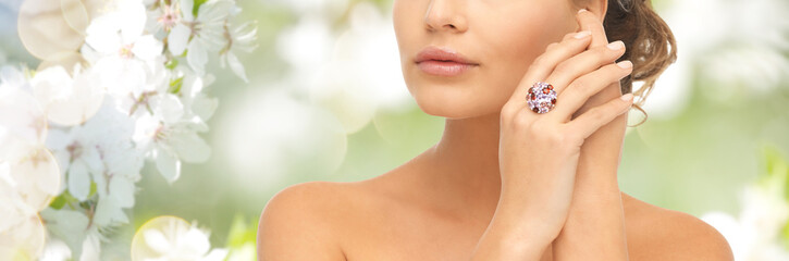 Poster - close up of woman with cocktail ring on hand