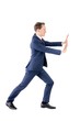 © WavebreakMediaMicro - A businessman pushing something