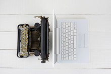 Laptop And Typewriter