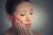 © pathdoc - woman with sensitive tooth ache crown problem about to cry from pain