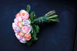 Pastel roses in bridal bouquet