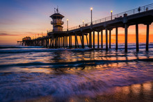 Waves In The Pacific Ocean And The Pier At Sunset, In Huntington