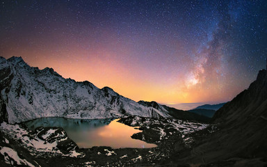 Wall Mural - milky way under the mountains