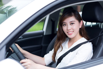 Asian beautiful woman driving car portrait