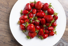 Strawberryes On White Plate