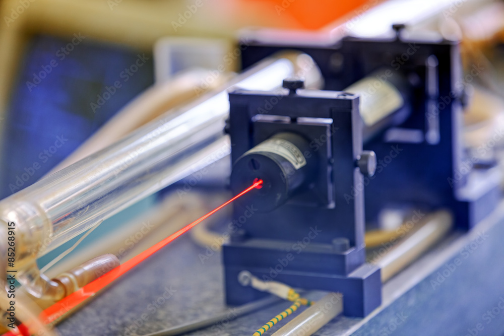 Red laser in laboratory Stock Photo | Adobe Stock