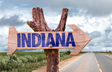 Wall Mural - Indiana wooden sign with road background