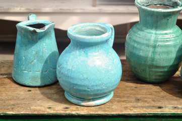 Old ceramic jug on the vintage table