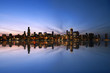 Chicago Skyline Reflecting On Lake Michigan 