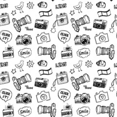 Hand drawn vector photography doodles seamless pattern.