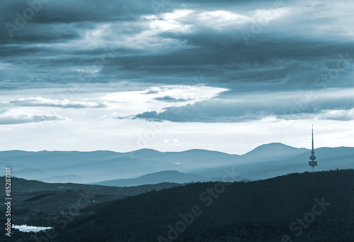 The Black Mountain And Beyond During Dusk Twilight Poster