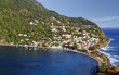 Fishing village in Dominica, Caribbean Islands Scotts Head Dominica is a fishing village in Domica, Caribbean Island. It is the meeting point of Atlantic Ocean and the Caribbean Sea (Soufriere Bay).