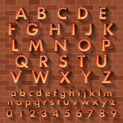 Vector illustration of realistic ball lamp alphabet for light board.Orange grow text on brick wall as background
