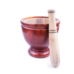 wooden mortar and pestle isolated on white background