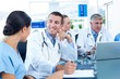 © WavebreakmediaMicro - Team of doctors having a meeting