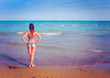 © Patrizia Tilly - backside of a girl standing at the beach-summer 11