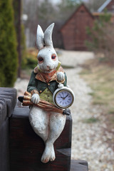 Wall Mural - Clock. Hare with umbrella