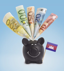Various european banknotes in a happy piggybank of Cambodia.(ser