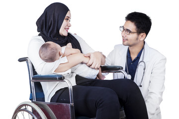 Poster - Doctor speaking with muslim mother