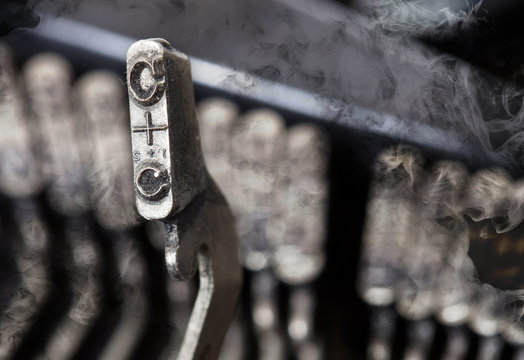 C hammer - old manual typewriter - mystery smoke
