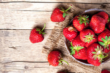 Fruit. Fresh Strawberries On Old Wooden Background