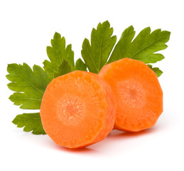 Chopped carrot slices and parsley herb leaves still life isolate