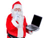 © Steve Cukrov - Santa Claus Holding Laptop